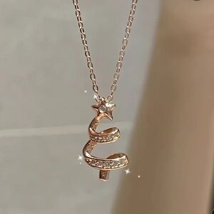 Gold Spiral Pendant Necklace with Sparkling Stones